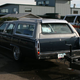 Illustration for article titled What Do You Do With A Crushed Mazdasaurus? Haul It Away With A Caddy Wagon!